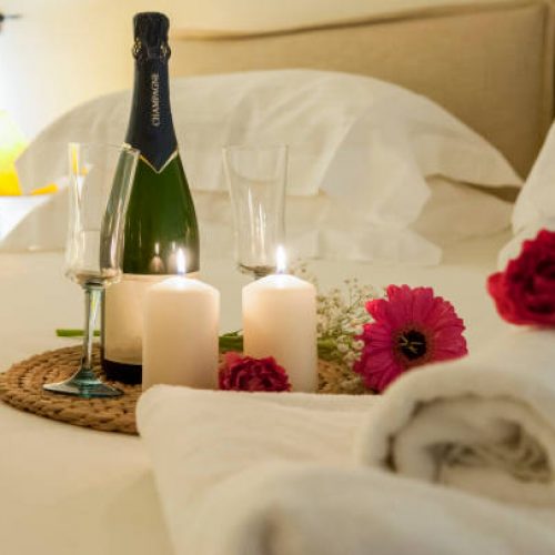 romance in bed with champagne